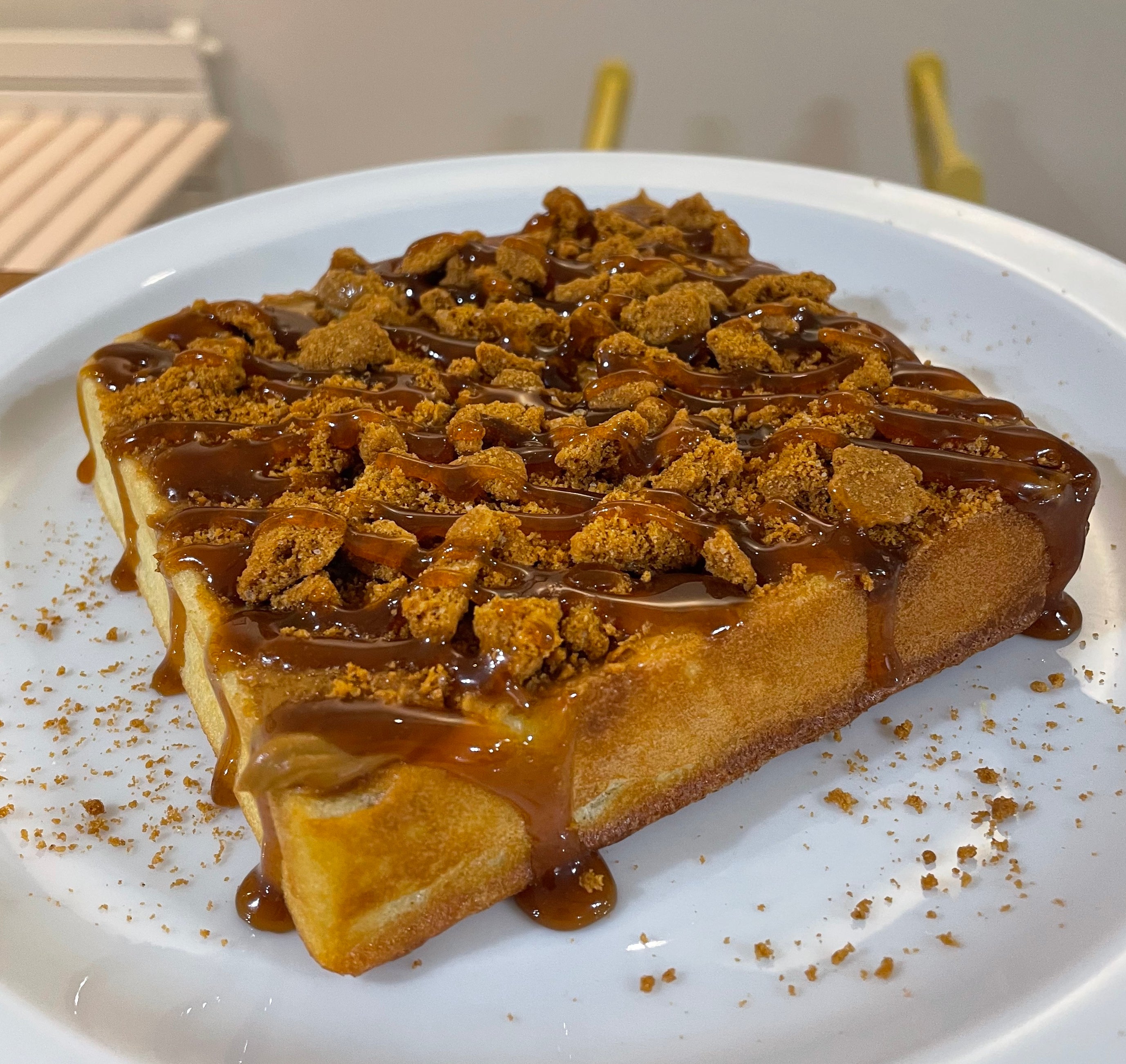 Nana's buttermilk waffle with Lotus Biscoff spread & crushed Lotus cookies. Drizzled with caramel.