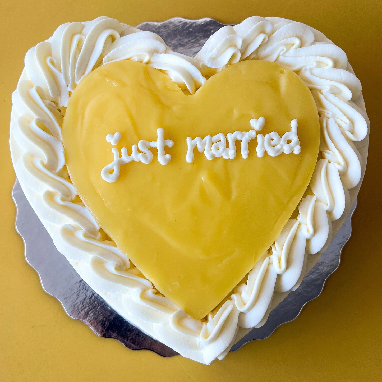 heart shape lemon crepe cake with a zesty lemon curd